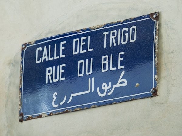 A multi-language street sign in the north of Morocco