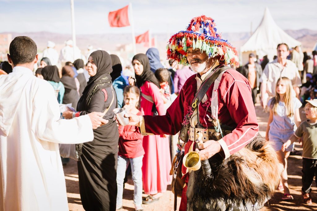 Man selling water in Rose Festival Kalaat Mgouna